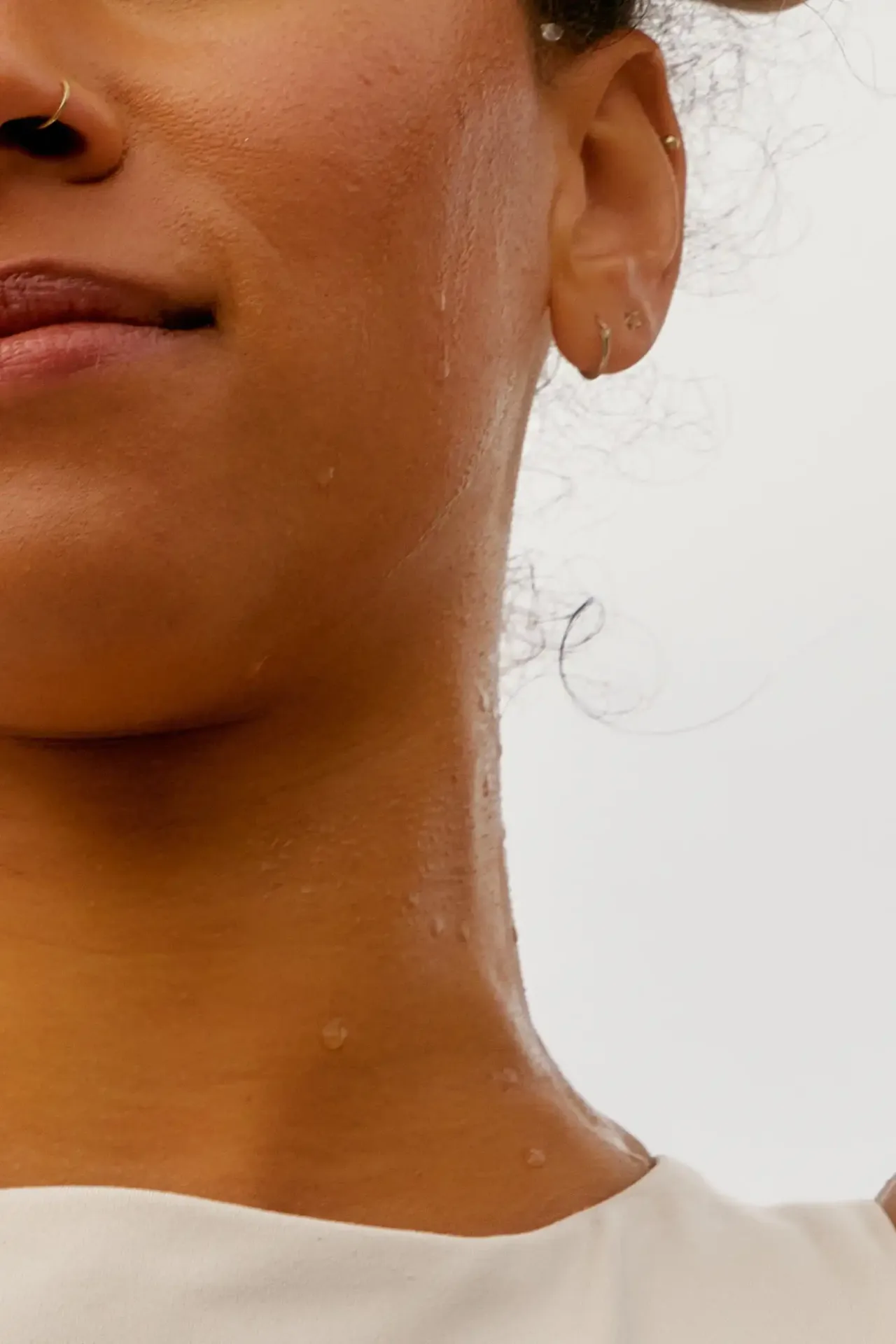 Close-up portrait of a woman with glowing skin